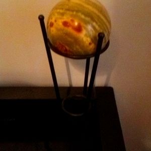 Marble ball on metal stand